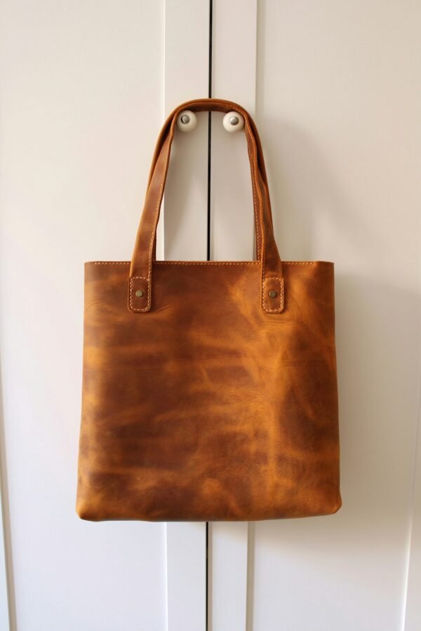Editorial leather tote image; illustrative category photo